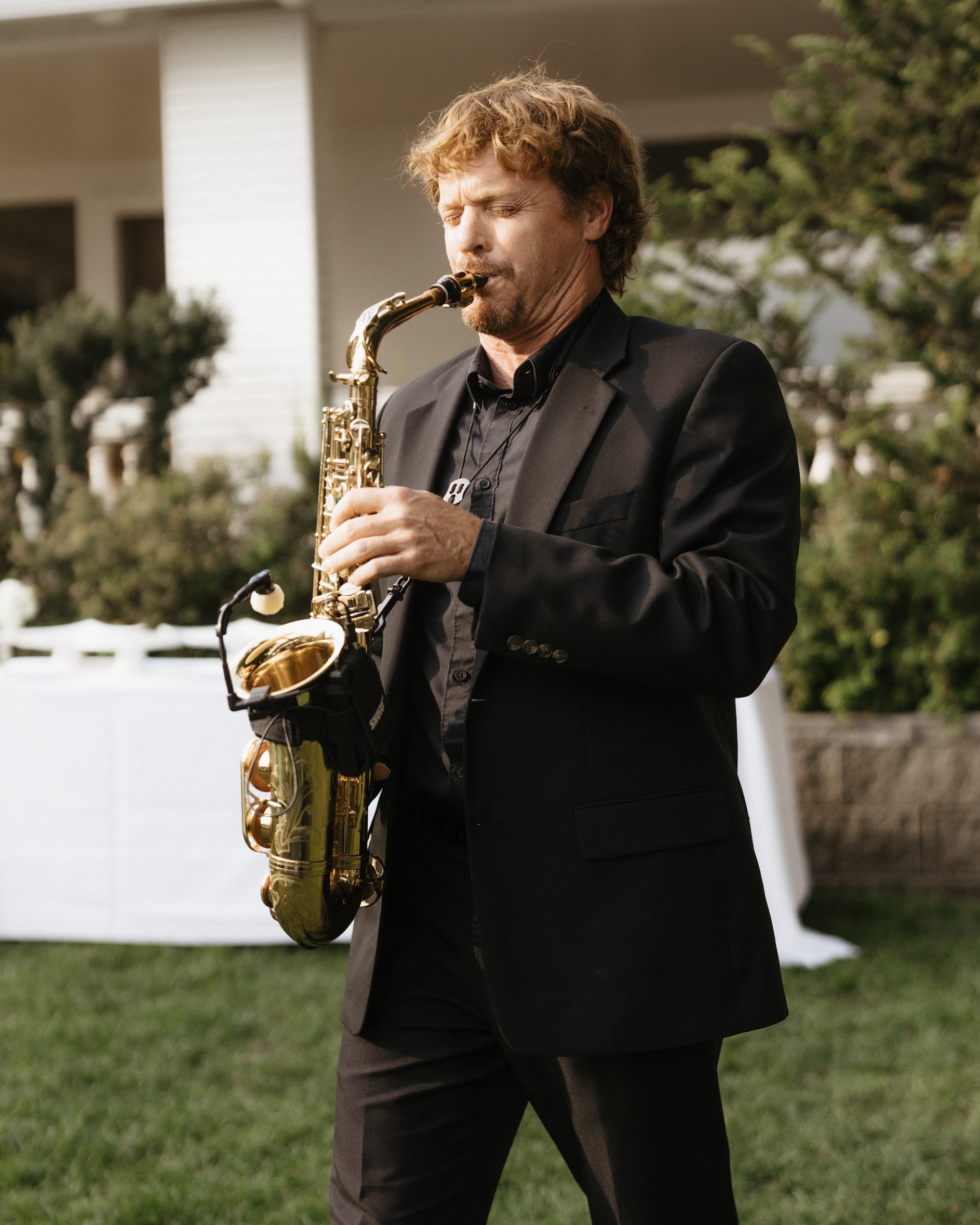 David performing saxophone at a wedding in the Spokane area